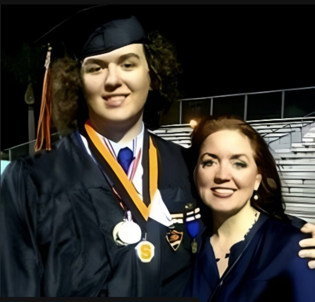 A photo of Susan Nilon with her son at his graduation
